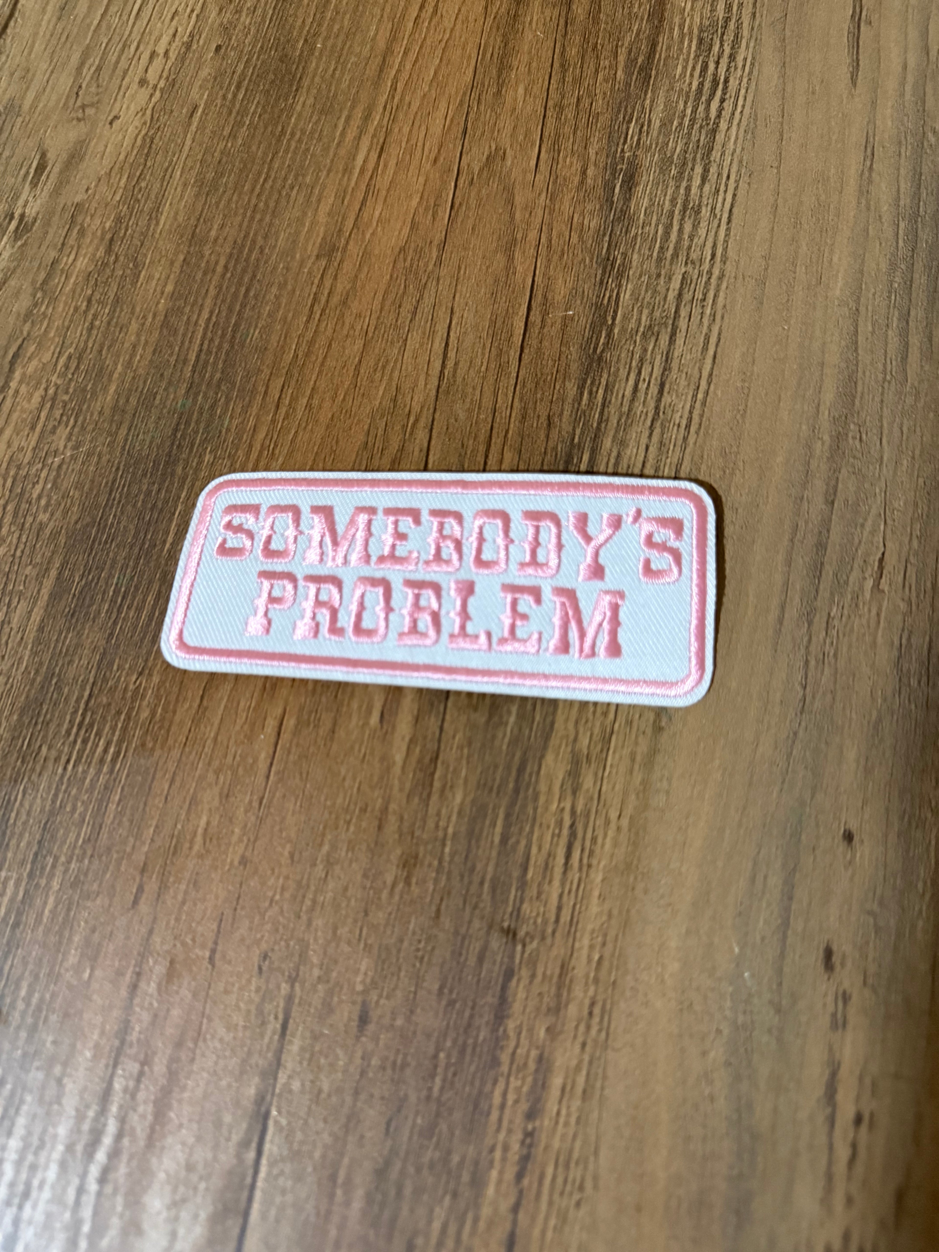 Somebody’s problem pink