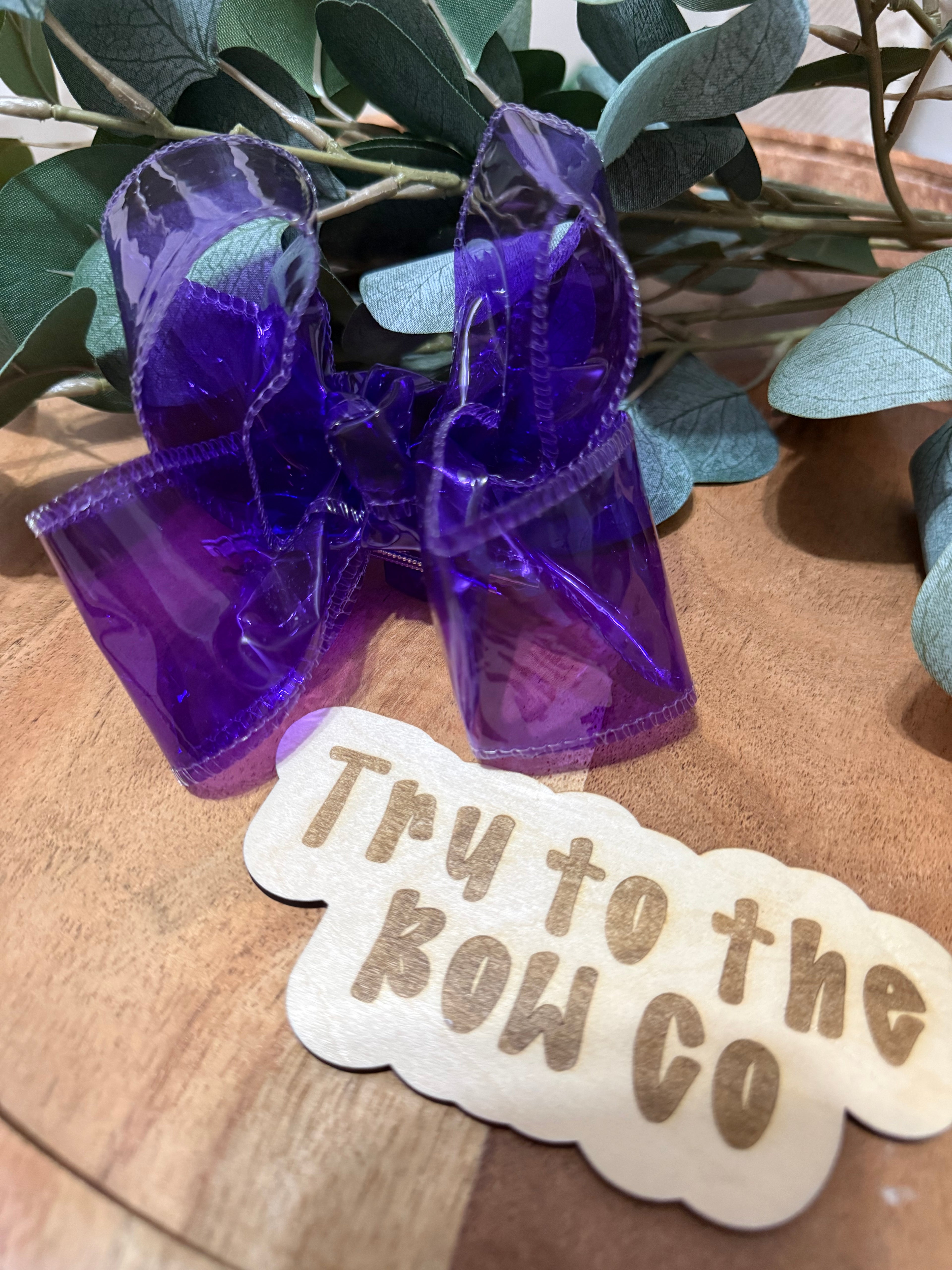 Purple swim bow
